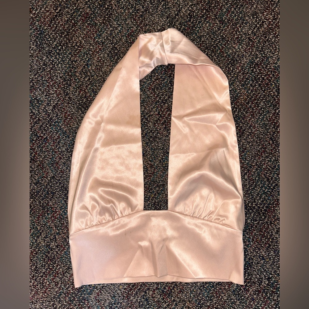 Silk and sexy going out top from boutique in Laguna beach. Only worn once.